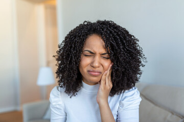 Tooth Pain And Dentistry. Beautiful Young Woman Suffering From Terrible Strong Teeth Pain, Touching...