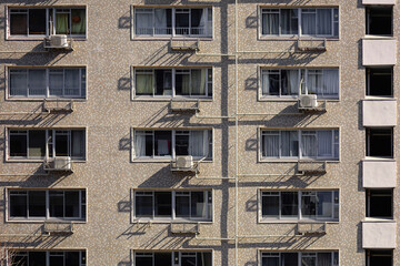 Fototapeta na wymiar Close up photo of the exterior of a Japanese apartment building built in the 1970s
