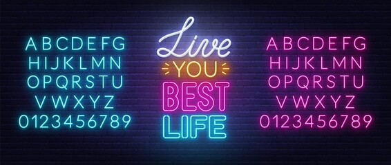 Live You Best Life neon lettering on brick wall background.