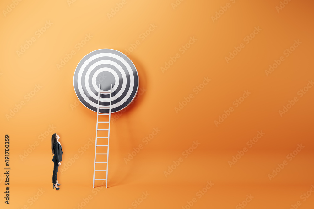 Poster businesswoman looking at abstract ladder leading to bulls eye target on orange wall background with 