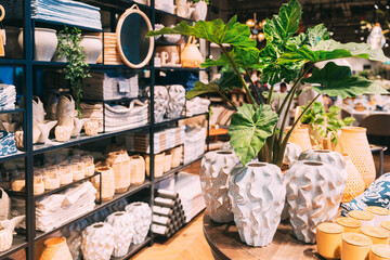 View of assortment of decor for interior shop in store of shopping center. Home accessories and...