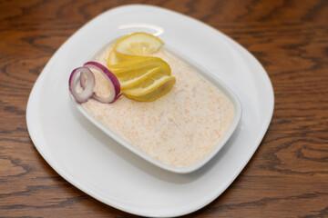 carp caviar, with oil, mineral water and lemon juice