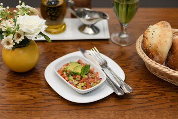 clod snack guacamole with avocado, cherry tomatoes, garlic, hot peppers and basil