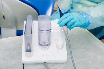 Ultrasonic scaler in the dental office. Dentistry Concept