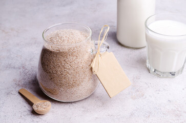 Brown psyllium in a glass jar