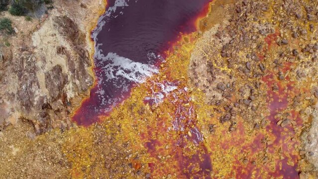 Located in a region that legend claims was part of King Solomon's mines, the Rio Tinto looks like deep, red wine, because iron is dissolved in the highly acidic river water. 