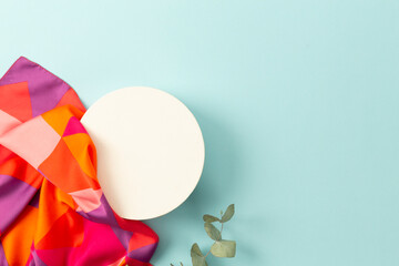 red scarf on turquoise background