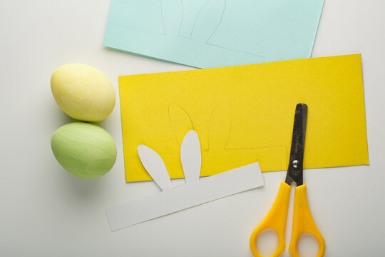 Step-by-step creation of a cardboard hare-shaped Easter egg holder. DIY concept. DIY decoration for the Easter holiday.