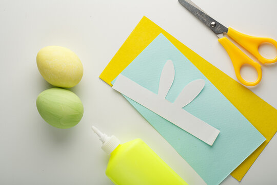 Step-by-step creation of a cardboard hare-shaped Easter egg holder. DIY concept. DIY decoration for the Easter holiday.