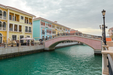 Fototapeta na wymiar Venetian bridge in the Qanat Quartier at the Pearl in Doha, Qatar