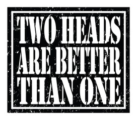 TWO HEADS ARE BETTER THAN ONE, text written on black stamp sign