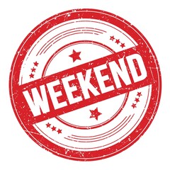 WEEKEND text on red round grungy stamp.