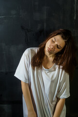 Fototapeta premium portrait of a young woman with emotions suffering, sadness, pain, depression, mental disorders, psychology 