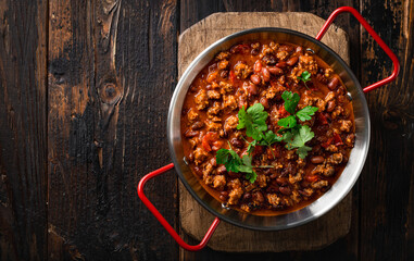 Chili con carne, traditional mexican food, top view, copy space