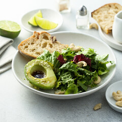 Healthy green salad with avocado