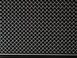 metal speaker grill, monochrome abstract surface.