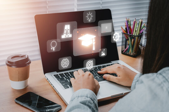 Online education training, Person hand using laptop computer with VR screen education icon background, webinar online. - Powered by Adobe