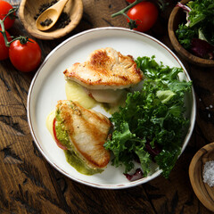 Chicken stuffed with pesto, tomato and cheese