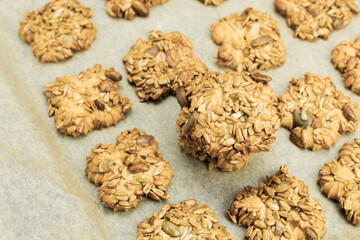 Fresh cookies with milk on a wooden table