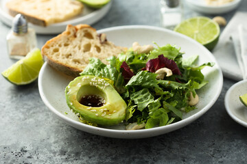 Healthy green salad with avocado