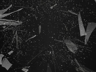 Pieces of shattered glass broken or cracked on black