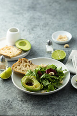 Healthy green salad with avocado