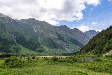 Fototapeta na wymiar A mountain valley in the gorge of the Cherek-Balkar river in the vicinity of the Ushtulu tract. Caucasus 2021