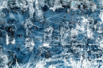 Old rustic stone wall surface with dark blue rough grunge texture
