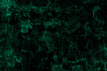 Dark green color seamless rough textured old abandoned stone wall surface for background