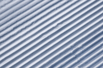 matière de neige damée pendant l'hiver en montagne