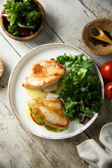 Chicken stuffed with pesto, tomato and cheese