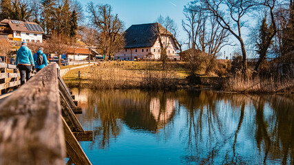 Beautiful winter wonderland with reflections at the famous Hoeglwoerther See lake, Hoeglwoerth,...