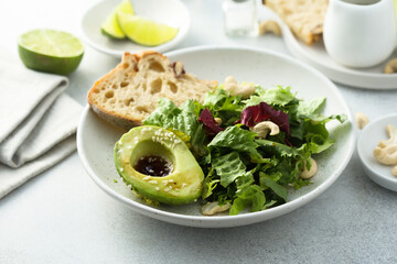 Healthy green salad with avocado