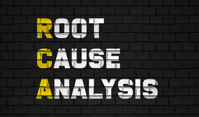 Fototapeta na wymiar Root cause analysis (RCA) concept,business abbreviations on black wall 