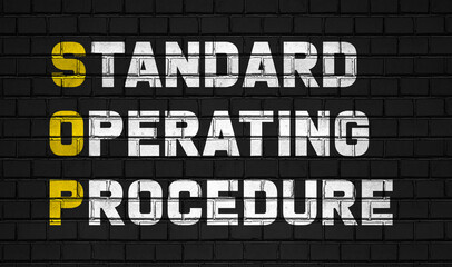 Standard operation procedure (SOP) concept,business abbreviations on black wall 