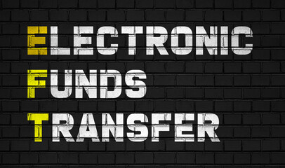 Electronic funds transfer (EFT) concept,business abbreviations on black wall 