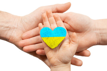 Blue and yellow heart in hands on a white background. War in Ukraine, save independence.