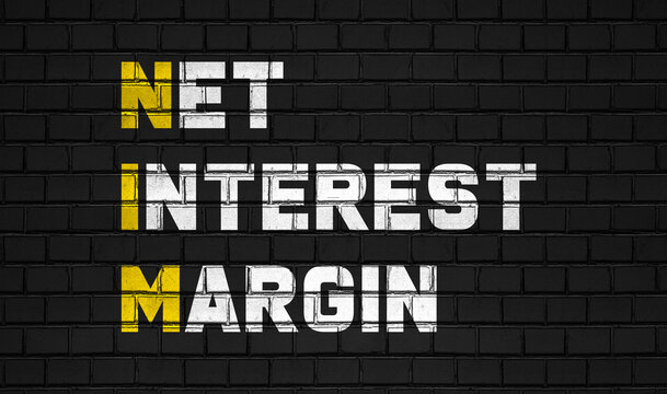 Net interest margin (NIM) concept,business abbreviations on black wall 
