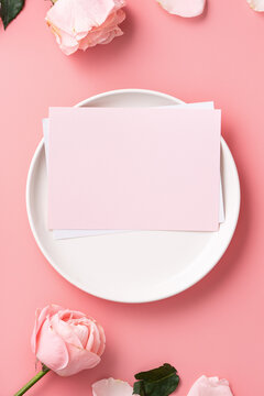Mother's Day sending gift and meal design concept background with pink rose flower on pink background.
