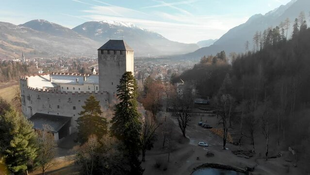 Aerial view of Lienz Castle and valley in winter season, Austria