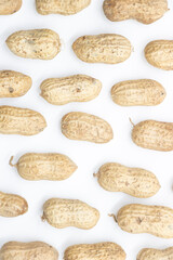 Useful peanut, close-up, isolated on white background.