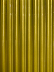 Yellow textured wall with blur