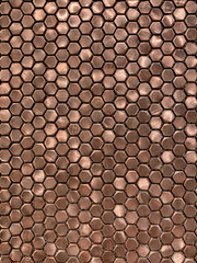 Bronze wall of small details close-up