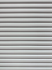 Gray wall with horizontal lines and blur