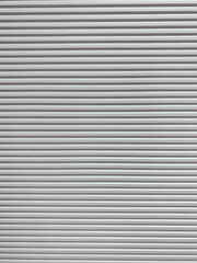 Gray wall with horizontal lines and blur