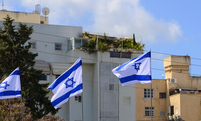 Old city districts in Tel Aviv. Lots of Israeli flags.