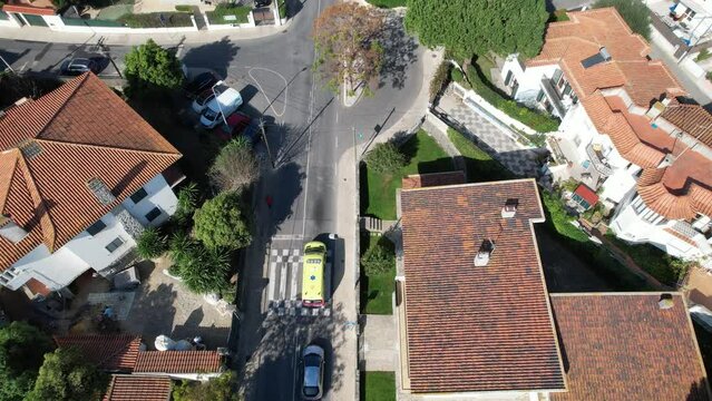 From above an ambulance in a sign of urgency moving slowly, Lisbon,Portugal