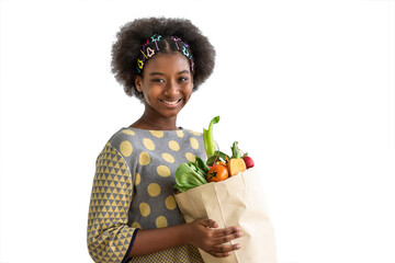 Young beautiful African black girl woman holding paper grocery shopping bag full of fresh healthy...
