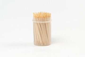 Toothpicks in a cylindrical box isolated on white background, too much dental pick, box of...