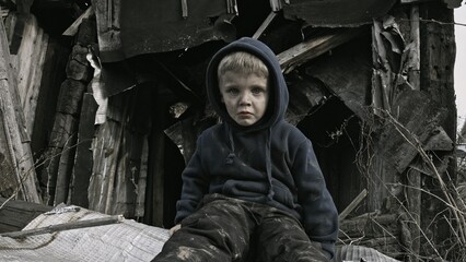 Fototapeta na wymiar A child is crying in the ruins